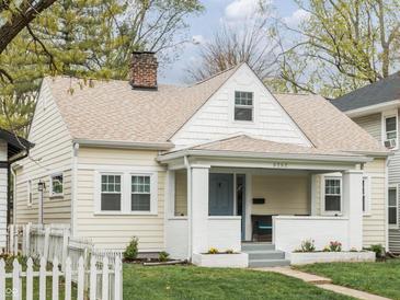 Charming one-story home with a welcoming front porch and a freshly painted exterior at 5252 N College Ave, Indianapolis, IN 46220