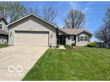 Charming home with manicured front yard, inviting curb appeal at 1502 Austin Dr, Lebanon, IN 46052