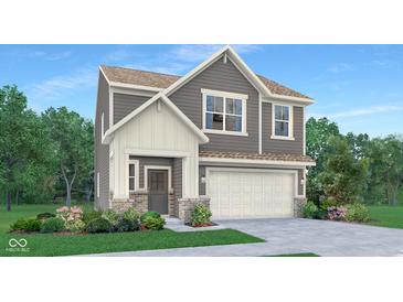 Charming two-story home with gray siding, white trim, covered entry, and attached two car garage at 15334 Swallow Falls Way, Fishers, IN 46037