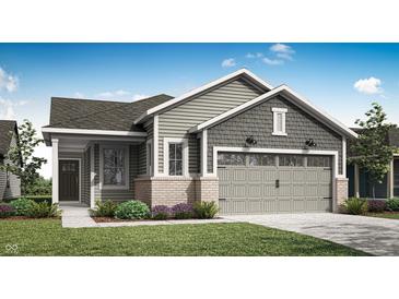Charming single-story home with neutral siding, brick accents and a two-car garage at 19743 Boulder Brook Ln, Westfield, IN 46074