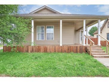 Charming single-Gathering home featuring a spacious front porch and inviting curb appeal at 625 Maple St, Columbus, IN 47201
