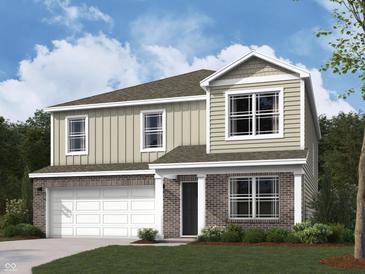 Charming two-story home with a combination of brick and siding, complemented by a well-manicured lawn at 50 Benfield Dr, Whiteland, IN 46184