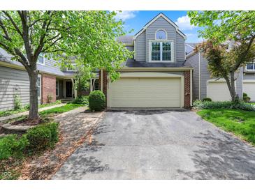 Charming two-story home featuring a two-car garage and well-maintained landscaping at 6505 Miramar Ct, Indianapolis, IN 46250