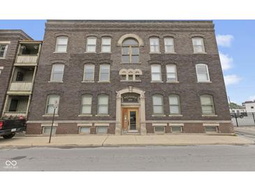 Elegant exterior of a brick building with symmetrical windows and a classic entrance at 108 E Saint Clair St # E, Indianapolis, IN 46204