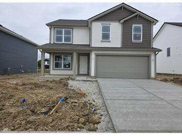 Two-story home with gray-tone accents, white siding, and a two-car garage at 11302 N Quillow Way, Monrovia, IN 46157