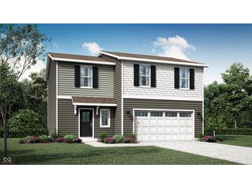 Charming two-story home featuring horizontal siding, a covered entryway, and an attached two car garage at 11929 Vale St, Indianapolis, IN 46235