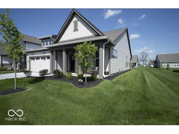 Charming single-Gathering home with a well-manicured lawn and attached two car garage at 345 Ehrlich Ln, Westfield, IN 46074