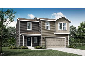 Two-story home featuring mixed siding, an attached garage, and neatly landscaped grounds at 11840 Vale St, Indianapolis, IN 46235
