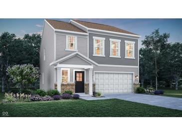 Charming two-story home with gray siding, a covered porch, and a well-manicured lawn at 3730 Cantebury Dr, Franklin, IN 46131