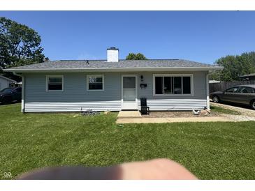 Charming single-story home featuring a well-maintained lawn and inviting entrance at 144 Bel Aire Dr, Whiteland, IN 46184