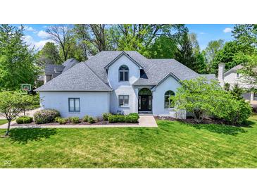 Beautifully landscaped front yard featuring a two-story home with a well-maintained lawn at 3162 Hazel Foster Dr, Carmel, IN 46033