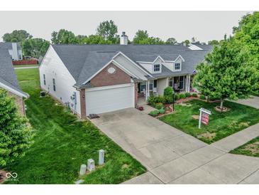 Charming single-story home with a well-manicured lawn and inviting front porch at 270 Rapid Rill Ln, Brownsburg, IN 46112