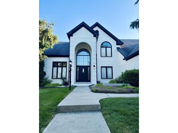 Beautiful two-story home featuring a grand entrance and landscaped front yard at 4601 Fairhope Dr, Indianapolis, IN 46237