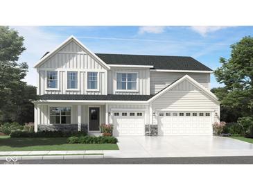 Charming two-story home with a three-car garage, board and batten siding, and stone accents at 7132 Sterling Way, Brownsburg, IN 46112