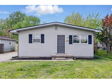 Charming single-story home with gray siding, dark shutters, and a well-maintained front yard at 316 S Roena St, Indianapolis, IN 46241