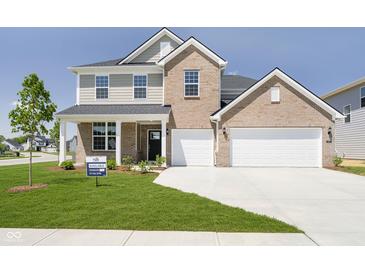 Two-story brick home featuring a two-car garage, landscaped yard, and an 'available' sign at 3256 Fawn Cir, Brownsburg, IN 46112