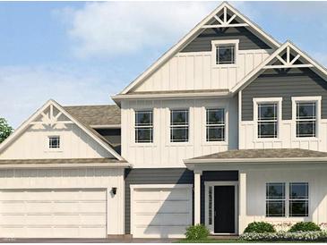 Charming new construction two-story home features white siding, a black front door and a two-car garage at 1534 Trichel Dr, Greenwood, IN 46143