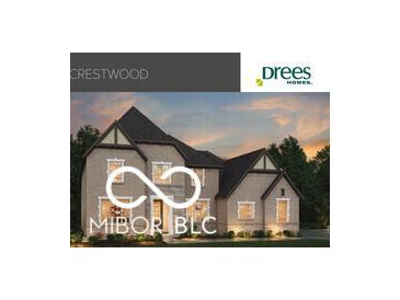New two-story home featuring a symmetrical design, brick exterior, and a dark roof adding character to the architecture at 9602 Fall Creek Rd, Indianapolis, IN 46256