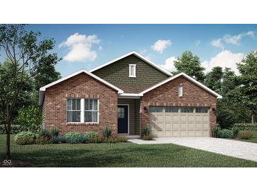 Charming brick home with a manicured lawn, an attached two-car garage, and manicured landscaping at 11904 Vale St, Indianapolis, IN 46235
