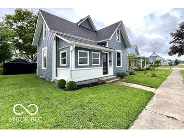 Charming two-story home with well-maintained lawn and welcoming curb appeal at 675 W Morgan St, Martinsville, IN 46151