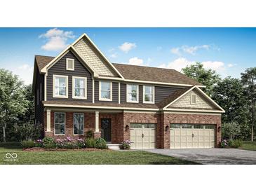 Charming two-story home with brick accents, a welcoming porch, and a spacious two-car garage at 11626 Aubrey Ln, Fishers, IN 46040