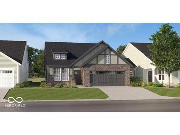Charming single-Gathering home with brick facade, a two-car garage, and manicured lawn at 5151 Nettleton Way, Avon, IN 46123