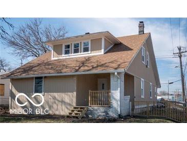 Charming home featuring a well-maintained lawn and traditional architecture at 2968 N Arsenal Ave, Indianapolis, IN 46218