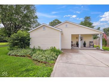 Charming single story home with covered front porch and landscaped garden at 71 W County Road 500 S, Clayton, IN 46118