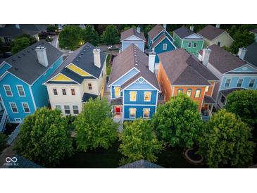 Aerial view of colorful, two-story homes with landscaped yards in a vibrant community at 2075 Rhettsbury St, Carmel, IN 46032