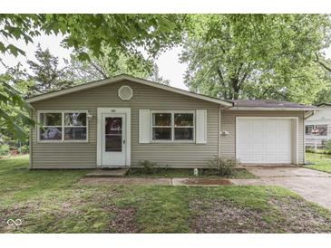 Charming single-story home with neutral siding, a garage, and a well-maintained front yard at 521 Elmhurst Pl, Whiteland, IN 46184