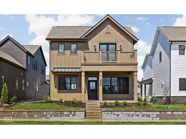 Charming two-story home featuring a second story balcony and professional landscaping at 1664 Carrollton Rail Dr, Westfield, IN 46074