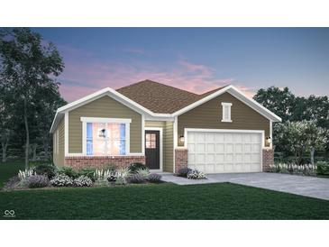 Inviting one-story home featuring a brick-accented facade, complemented by a pristine lawn and manicured landscaping at 8727 Marietta Ln, McCordsville, IN 46055