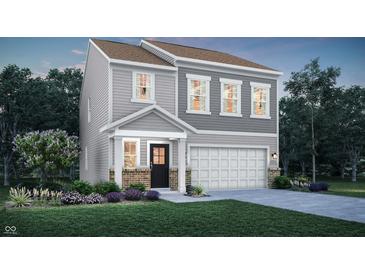 Charming two-story home with gray siding, a covered porch, an attached garage, and manicured front lawn at 15298 Farrington Way, Fishers, IN 46037