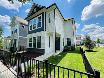 Charming two-story home with a manicured lawn and inviting curb appeal in a desirable neighborhood at 17399 Dovehouse Ln, Westfield, IN 46074