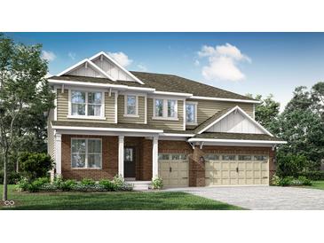 Beautiful two-story home featuring a brick and siding exterior, a two-car garage, and a covered porch at 4437 Persian St, Greenwood, IN 46143