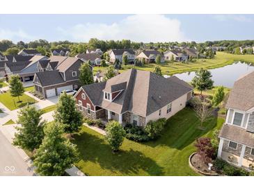 Beautiful home featuring a well-manicured lawn and attractive landscaping at 6337 Ederline Ln, Noblesville, IN 46062