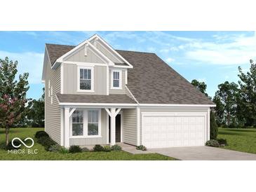 Charming two-story home with light siding, white trim, and an attached two-car garage at 8715 Hollander Dr, Camby, IN 46113
