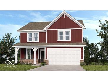 Inviting two-story home featuring white trim, a covered porch, and a spacious two-car garage at 444 Weaver Ln, Pittsboro, IN 46167