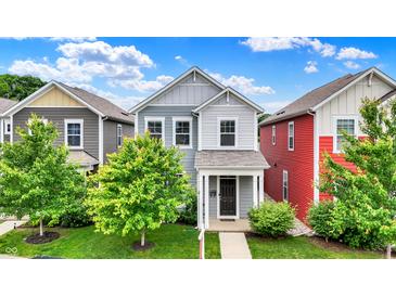 Charming two-story home with well-manicured lawn and inviting front porch at 158 Handley St, Indianapolis, IN 46222
