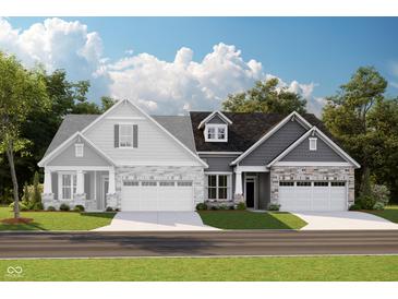 Charming home exterior with stone accents, gray siding, and a two-car garage at 7595 Bluegill Dr, Noblesville, IN 46062
