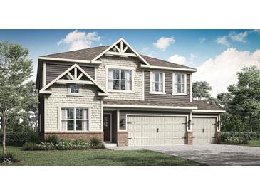Charming two-story home featuring a three-car garage and a beautifully landscaped front yard at 7664 Allesley Dr, Avon, IN 46123