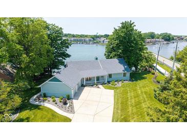 Beautiful waterfront home with large yard, attached garage, and fantastic lake views at 101 Edgewater Dr, Noblesville, IN 46062