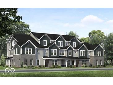 New construction townhome featuring gray siding, black roofing and trim and brick facade at 5790 Arcade Blvd, McCordsville, IN 46055