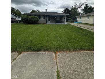 Charming single-story home with a well-maintained lawn and inviting curb appeal at 4113 W 30Th St, Indianapolis, IN 46222