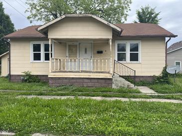Charming single-story home with covered porch and visible street number at 1020 E 30Th St, Anderson, IN 46016