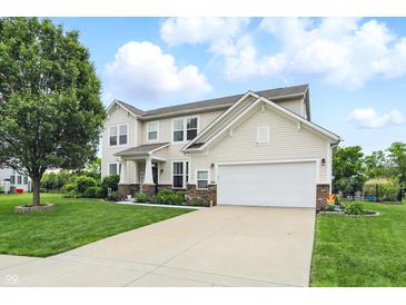 Charming two-story home with a well-manicured lawn and attached two-car garage at 1281 Jesse Ct, Greenwood, IN 46143