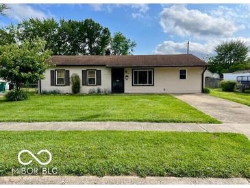 Charming single-story home with a well-manicured lawn and inviting curb appeal at 1998 Crescent St, Franklin, IN 46131