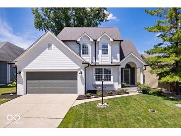 Charming two-story home with well-maintained lawn, updated windows and inviting curb appeal at 241 Chamberlain Cir, Noblesville, IN 46062