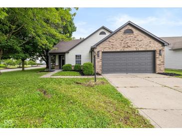 Charming single-Gathering home with a brick and siding facade, and an attached two-car garage at 3926 Rosefinch Cir, Indianapolis, IN 46228
