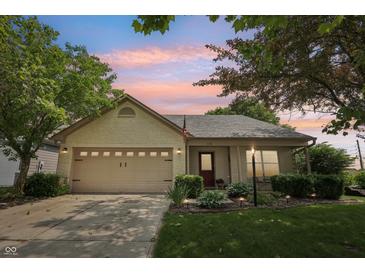 Charming one-story home with a well-manicured lawn and a two car garage, perfect for a Gathering at 110 Avon Ln, Noblesville, IN 46062